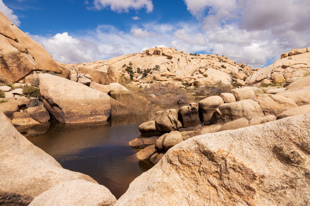 rock formation, water, blue sky, clouds