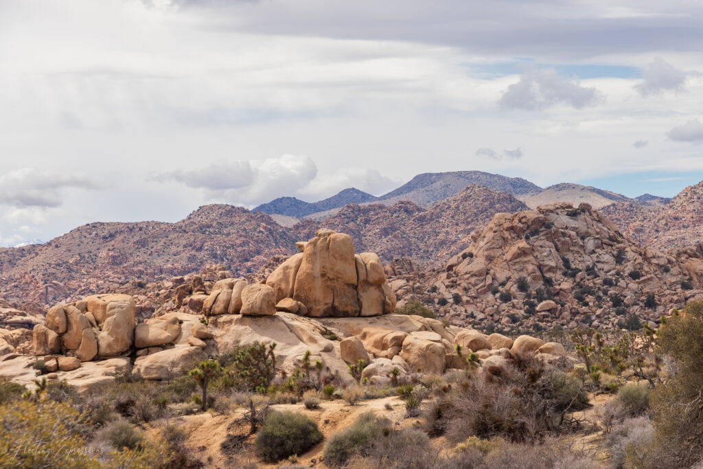 rock formations, desert landscape, overcast sky