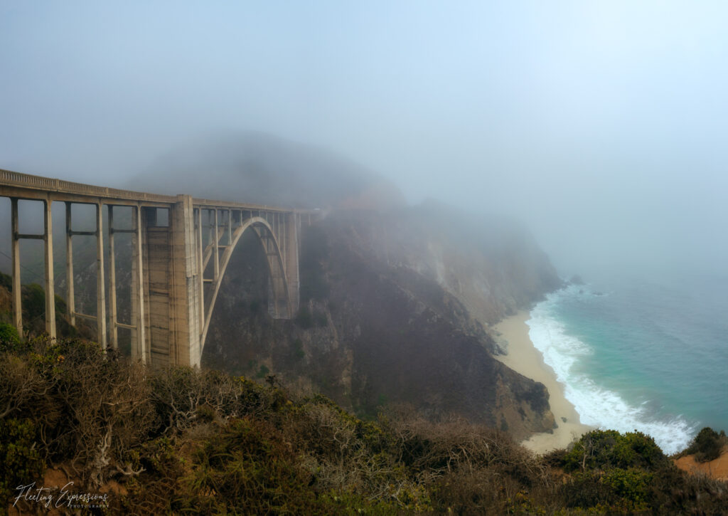 Iconic Bixby Creek Bridge on Hwy 1 in California shrouded in fog