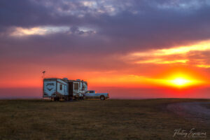 RV with orange and blue sunrise